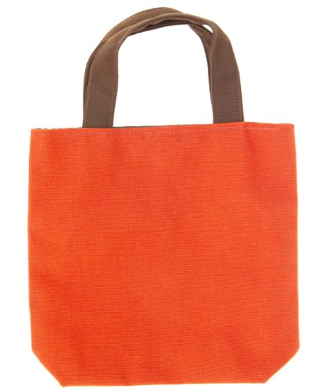 Orange cotton bag isolated on white background